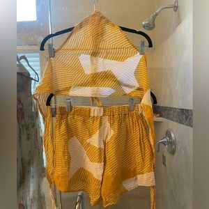 Two piece orange and white outfit